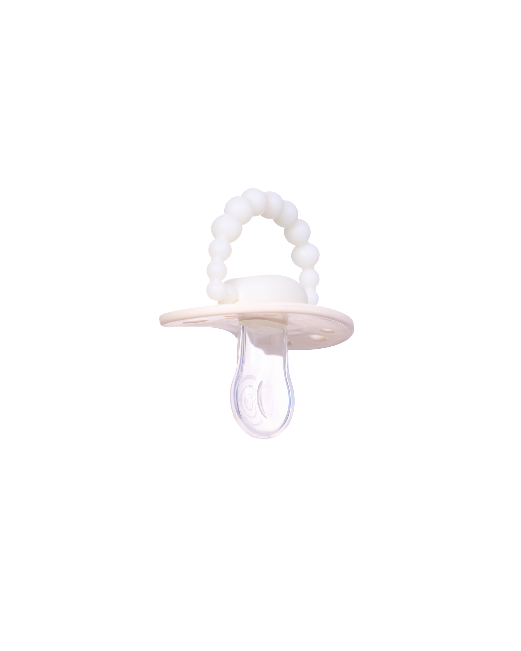 Świecący w ciemności smoczek LUU Kids American Cream Glow gumka tył kremowy świecący