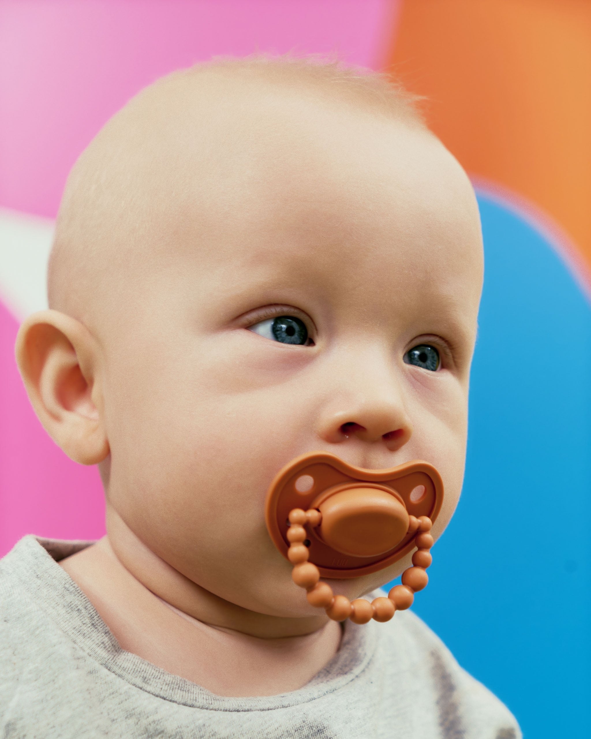 Smoczek pozycjonujący LUU Kids Pumpkin Spice gumka pomarańczowy